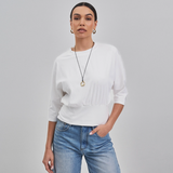 white 3/4 sleeved short sleeve top with  crew neckline