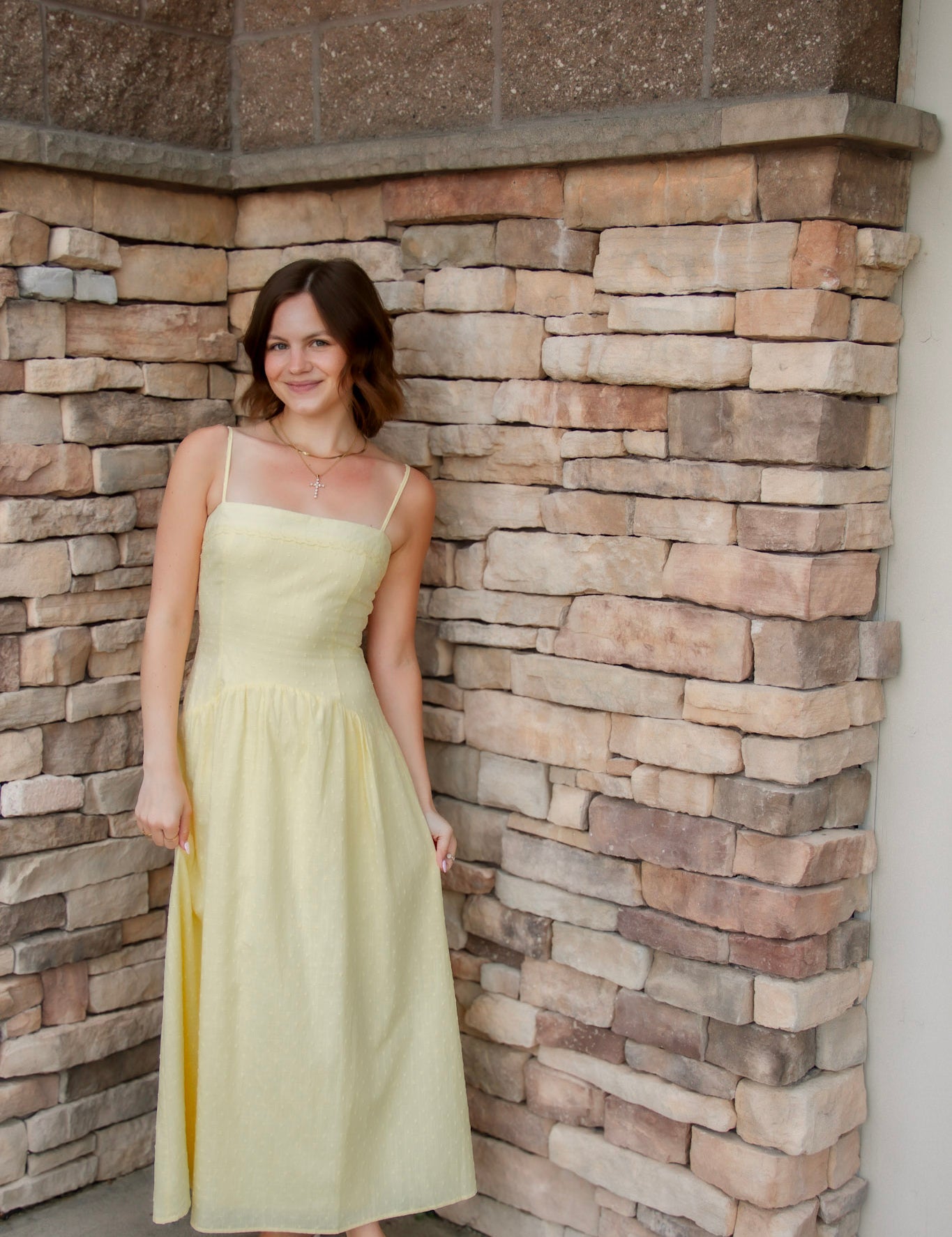yellow midi dress with drop waist, textured detail, adjustable spaghetti straps and yellow sandals