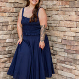 navy matching set featuring a navy midi skirt and a navy tank top 