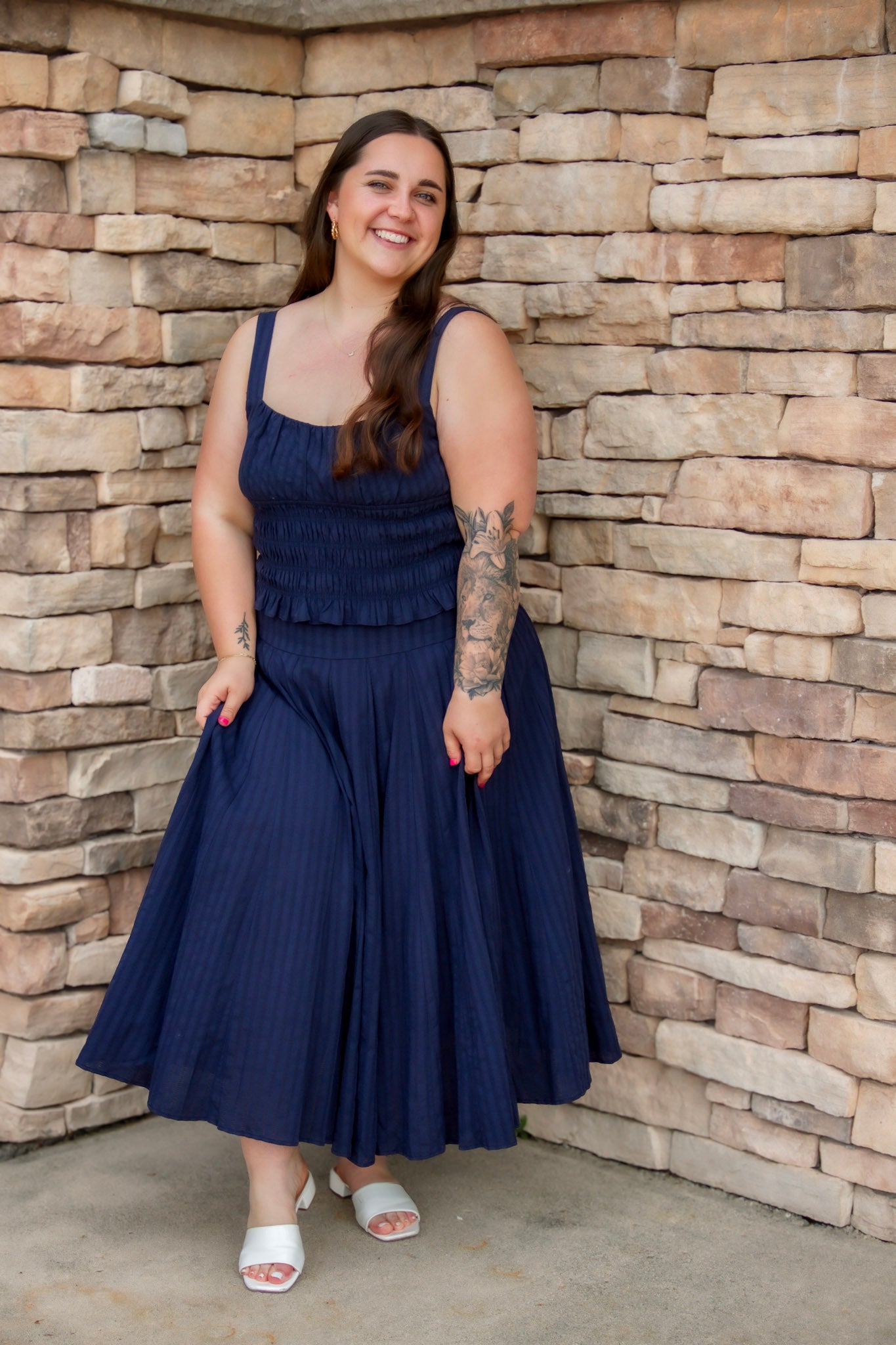 navy matching set featuring a navy midi skirt and a navy tank top 