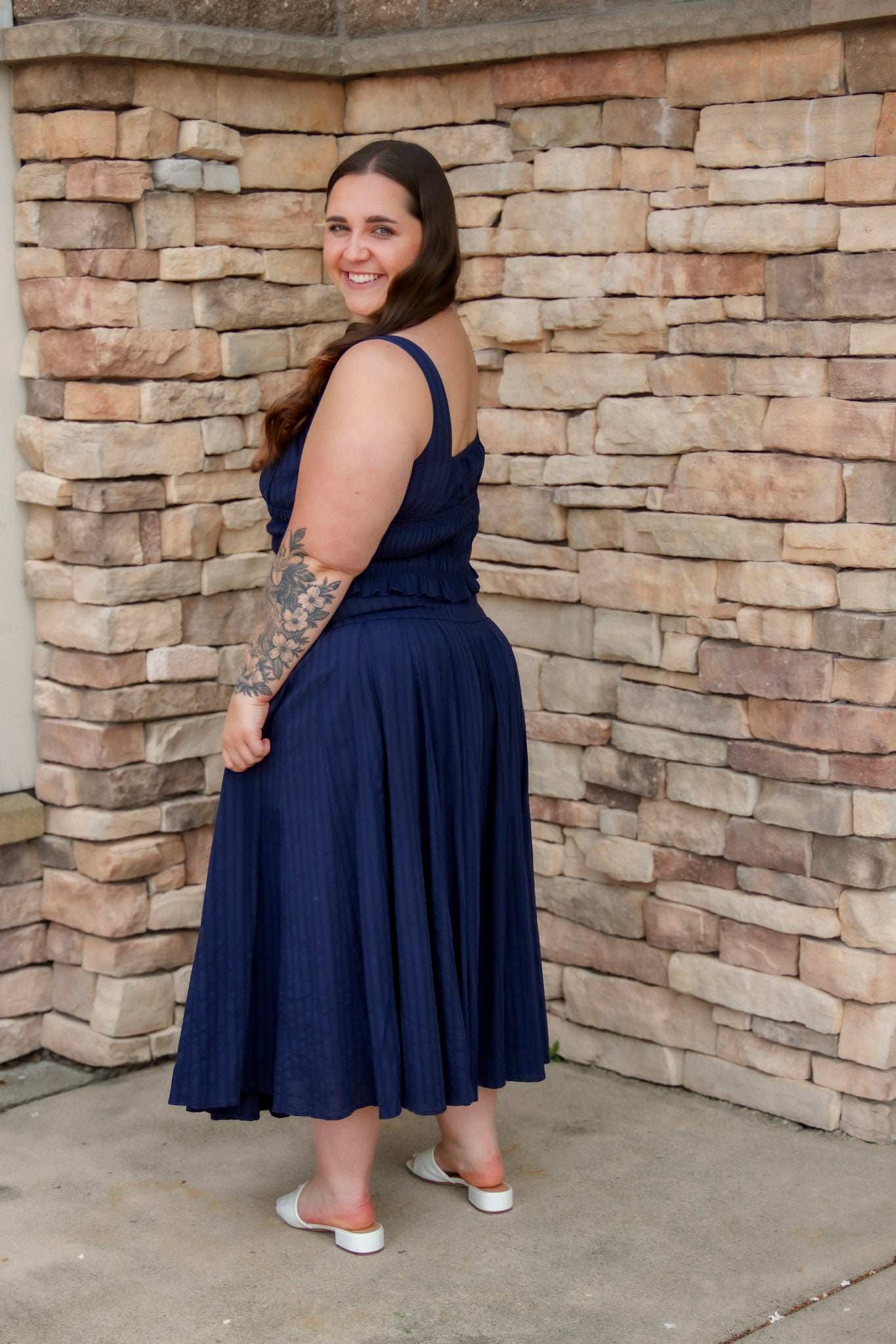 navy matching set featuring a navy midi skirt and a navy tank top 