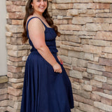 navy matching set featuring a navy midi skirt and a navy tank top 
