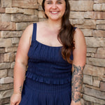 navy smocked top with stretch and a matching navy midi skirt 