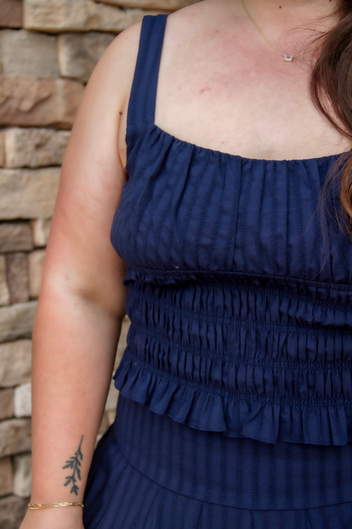 navy smocked top with stretch and a matching navy midi skirt 