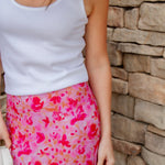 pink floral maxi skirt and white tank top 