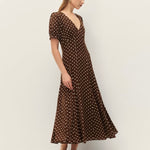 brown vneck style maxi dress with short sleeves and white polka dots
