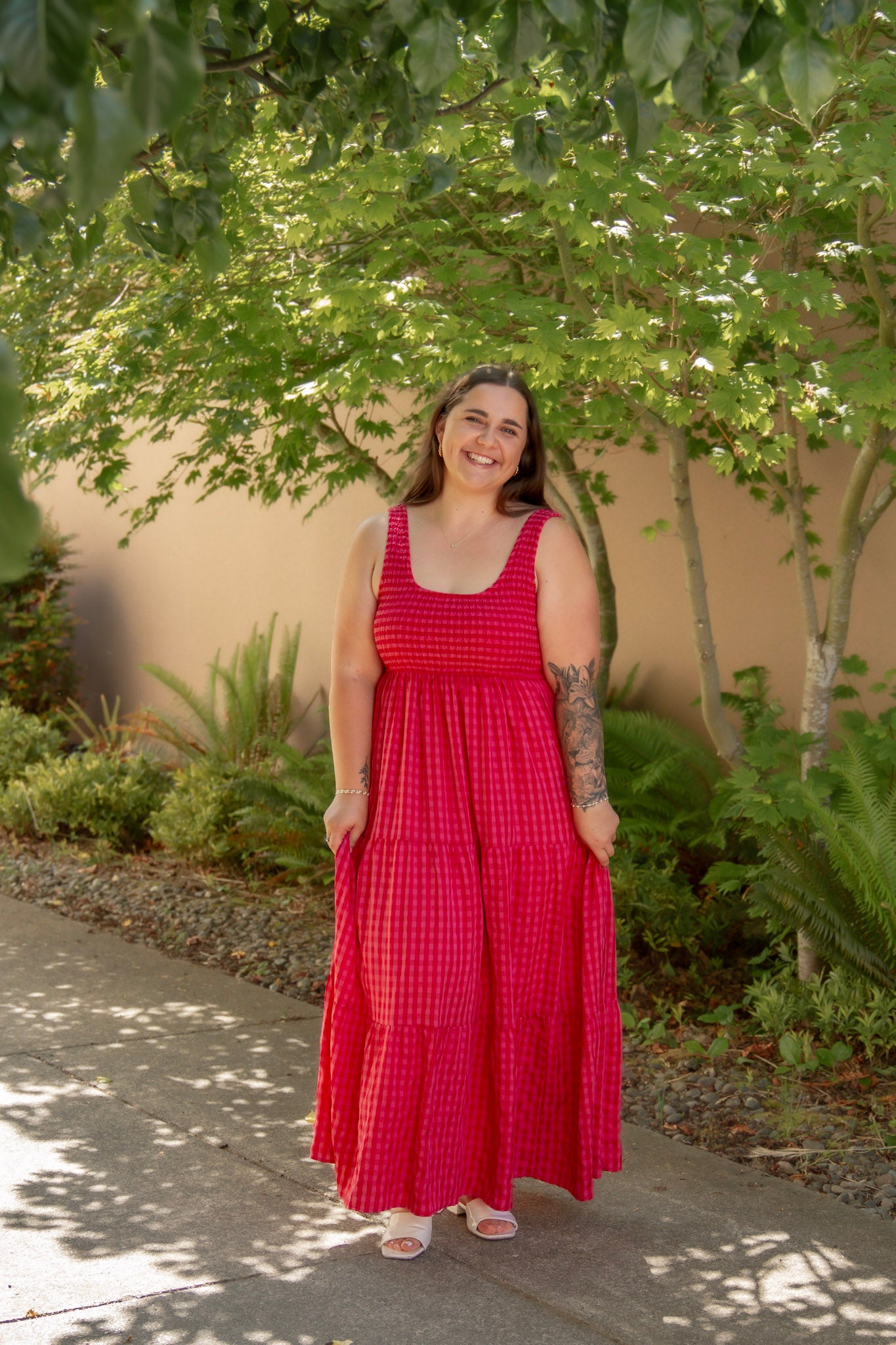 red and pink tank top style dress with tiered skirt and stretchy top