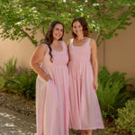 pink sundress with stretchy top and pockets