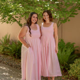 pink sundress with stretchy top and pockets