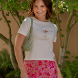 embroidered white tee with a colored spicy margarita and pink floral skirt 
