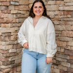 tan linen plus size button down semi cropped length with long sleeves and buttons down front