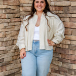 linen button down with long sleeves and white tank underneath