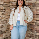 linen button down with long sleeves and white tank underneath