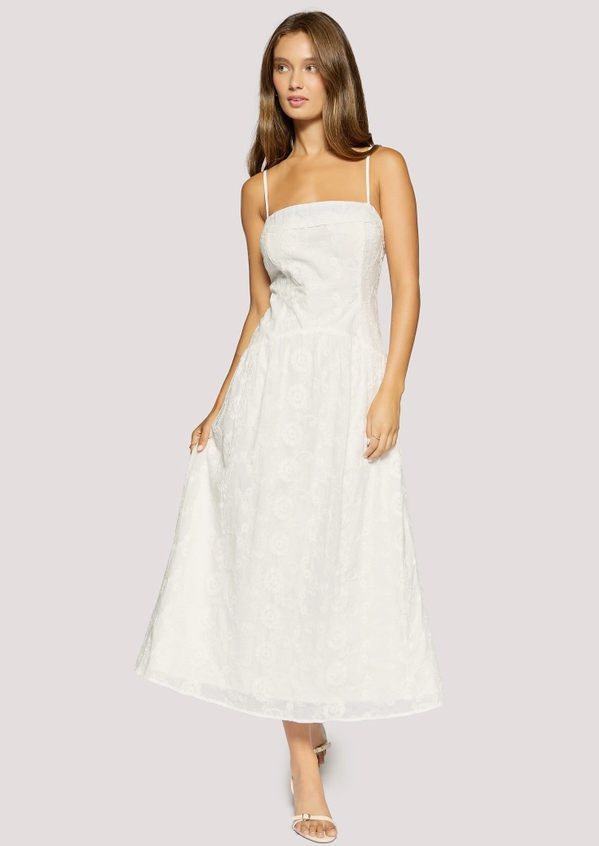 woman wearing a white spaghetti strap midi dress